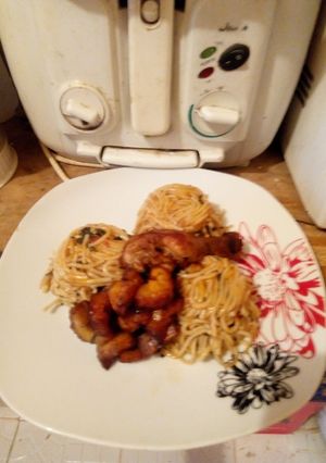 A picture of Jollof spaghetti with ugwu.