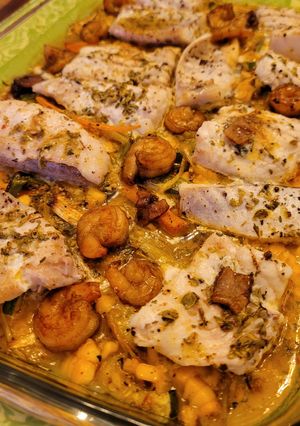 Una foto de Pescado con papas y verduras al horno!!