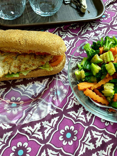 A picture of Egg burger with veg salad.