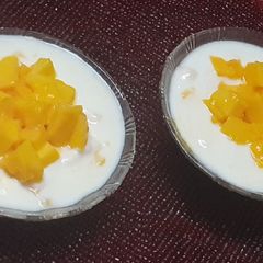 A picture of Curd mango delight dessert.