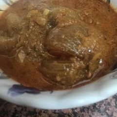 Stuffed Onion Pointed Gourd Curry A picture of Stuffed Onion Pointed Gourd Curry.
