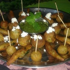 A picture of Navratree special cheese patato rolls & cheese French fries.