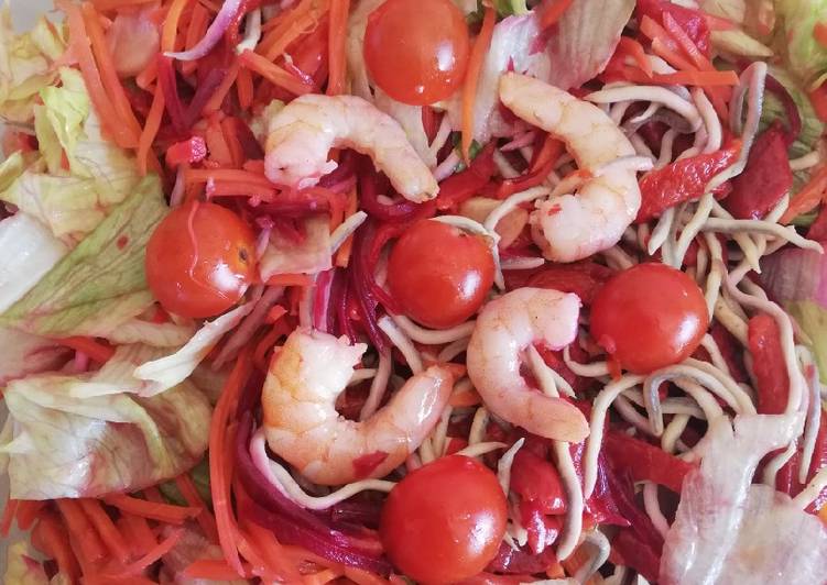 Ensalada templada de langostinos y gulas