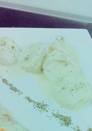 Una foto de Agnellotis de jamón y queso en salsa de cuatro queso