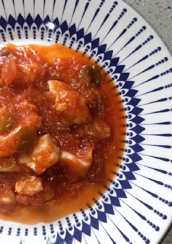 Una foto de Bacalao con tomate