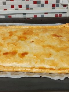 Una foto de Empanada de pulpo y gambas