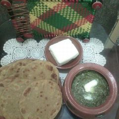 Sarson ka saag with butter & makai ki roti A picture of Sarson ka saag with butter & makai ki roti.