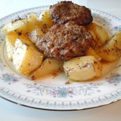 A picture of Roasted Oven Hamburgers with Lemon and Oregano Potatoes.