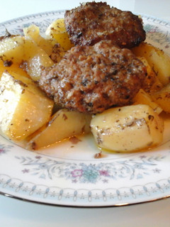 A picture of Roasted Oven Hamburgers with Lemon and Oregano Potatoes.