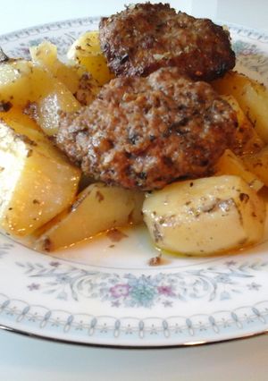 A picture of Roasted Oven Hamburgers with Lemon and Oregano Potatoes.