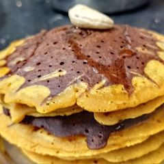 A picture of Vegan Chocolate pancakes with lemon zest.