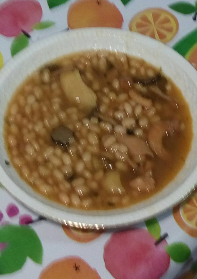 Una foto de Alubias estofadas con calamar