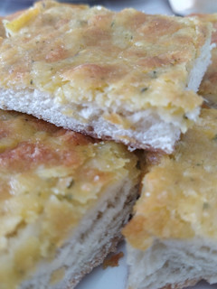 Una foto de Pan de ajo con queso
