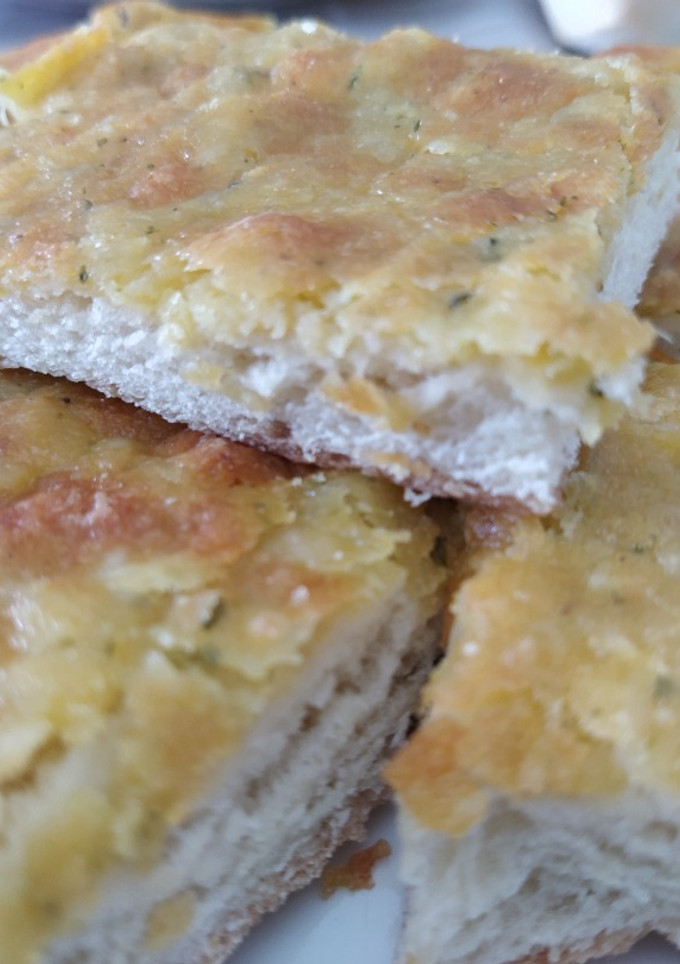 Una foto de Pan de ajo con queso
