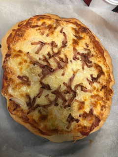 Una foto de Pizza carbonara