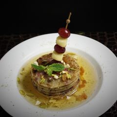 A picture of Apple & Grapes Malpua.
