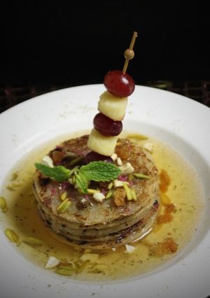 A picture of Apple & Grapes Malpua.