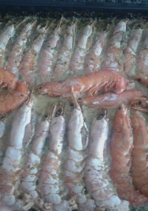 Una foto de Langostinos al horno con champán