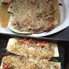 A picture of Baked stuffed ZUCCHINI.