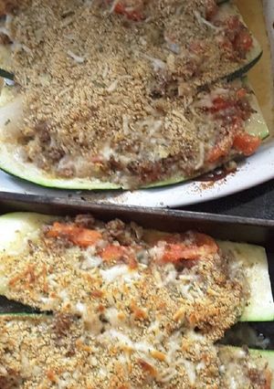 A picture of Baked stuffed ZUCCHINI.