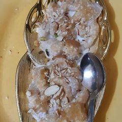 A picture of Instant jalebi in milk dip.