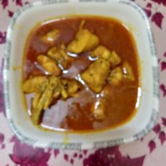A picture of Achaar ghoshat eat for poori.