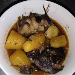 A picture of Cat fish with potatoes.