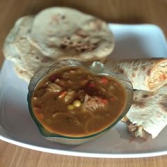 Flat bread and gravy soup A picture of Flat bread and gravy soup.