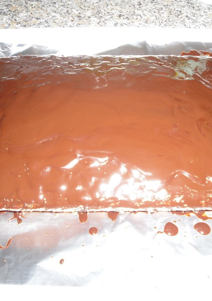 Una foto de Bizcocho con cobertura de chocolate