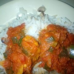 A picture of Rice and dried fish stew.