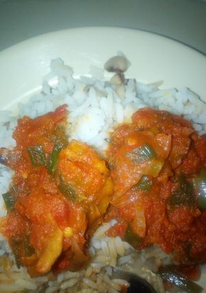 A picture of Rice and dried fish stew.