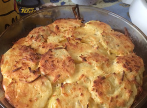 Una foto de Papas al horno con crema de leche