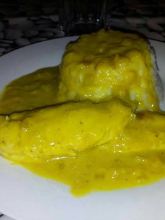 Una foto de Pollo al curry
