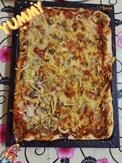 صورة لوصفة بيتزا بالتونه 🌼🍕