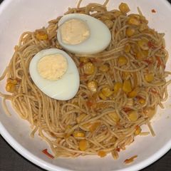 Corn spaghetti with hard boiled egg A picture of Corn spaghetti with hard boiled egg.