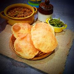 A picture of Wheat flour (aata) Puri.