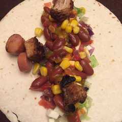 Una foto de Burrito de cerdo con salchicha
