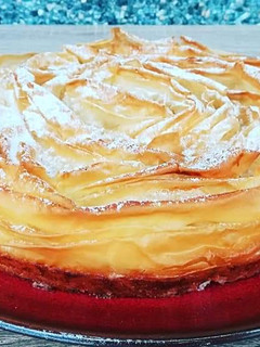 Una foto de Tarta flor con flan