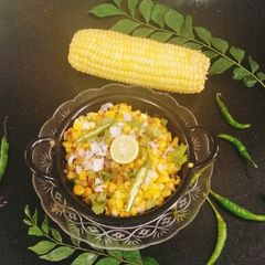 A picture of Sweet corn with Schezwan sauce.