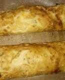 Omelette relleno con arroz, queso mantecoso, paleta y huevo duro
