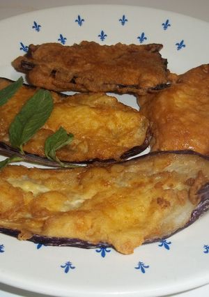 Una foto de Berenjenas rebozadas con queso rallado y en polvo