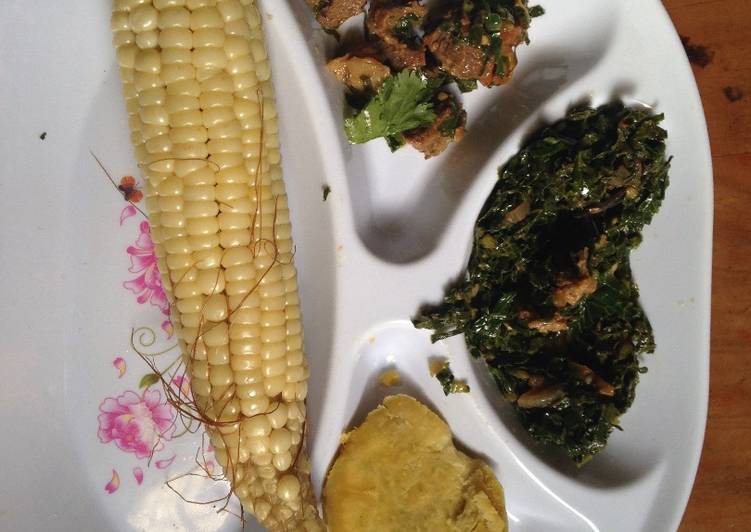 Recipe of Favorite Boiled maize served with boiled sweet potatoes and fried beef with kales