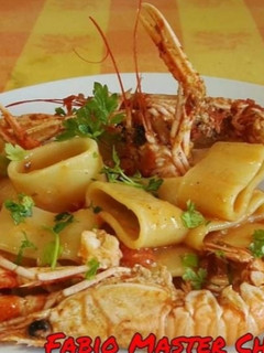 Foto di Calamarata con Pomodorini Freschi e Scampi Sfumati al Cognac
