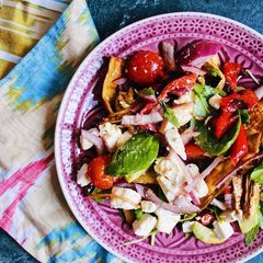 A picture of Salad with baked eggplant and red pepper, with feta cheese 🥗 🍆.
