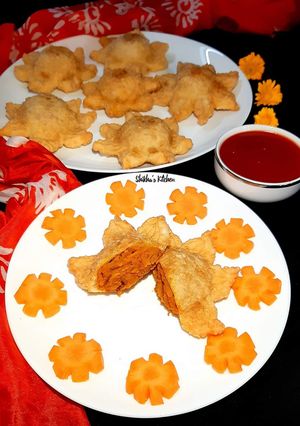 🥕🌻গাজরের পুরভরা সূর্যমুখী পিঠা🌻🥕 রেসিপির প্রধান ছবি