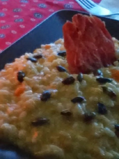 Una foto de Risotto de calabaza y crujientes