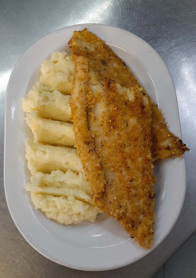 Una foto de Milanesa crocante de merluza