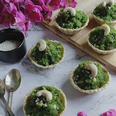 A picture of Sesame Crust Tart Filled With Peas Halwa.