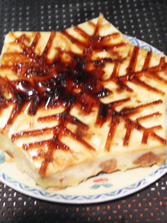 Una foto de Buding de pan con manzana