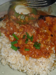 Una foto de Risotto con salsa y zapallito relleno